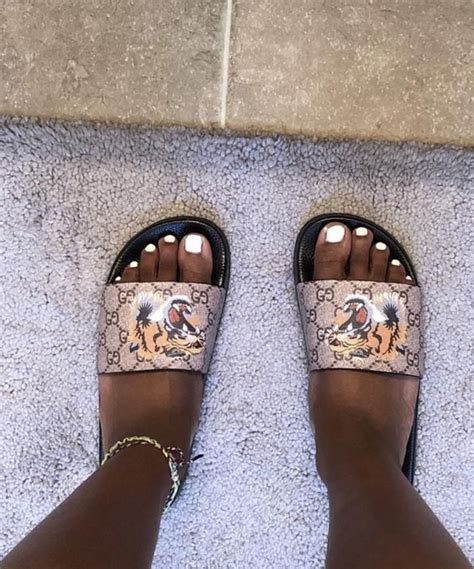 gucci slides with lion